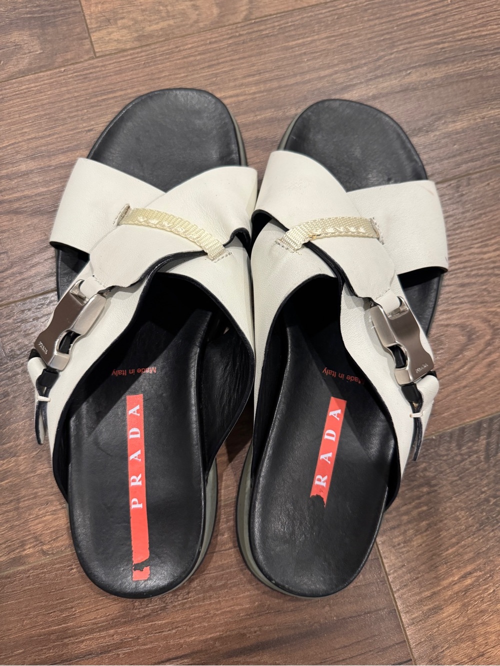 Prada Ivory & Black Leather Slide Mules with Silver Hardware CrissCross Sandals
